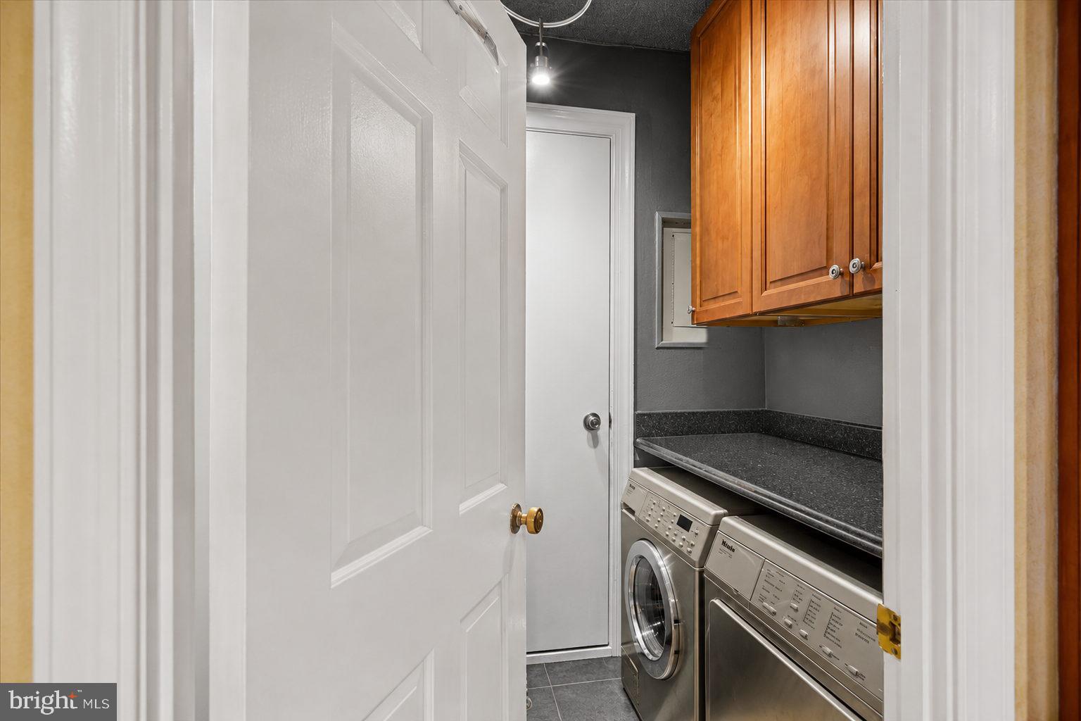800 25th Street Northwest, Unit 504 Washington, DC 20037 - Photo 43 of 52 Efficient laundry space with style.