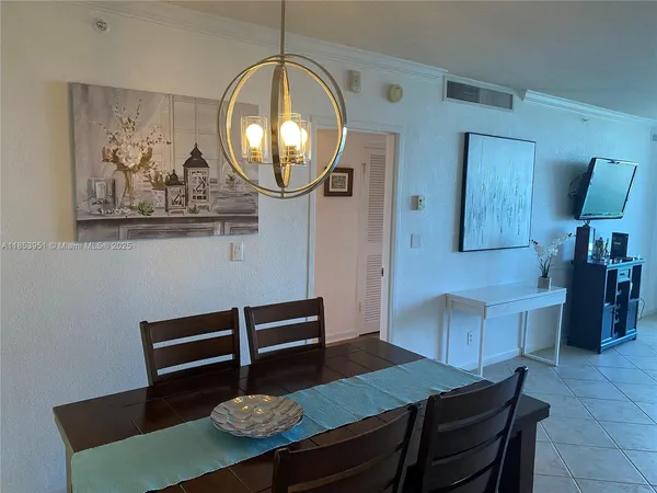 a view of a livingroom with furniture and wooden floor
