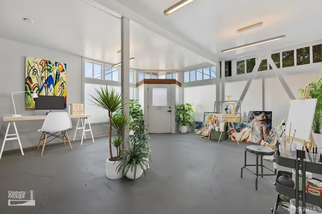 a living room with lots of furniture