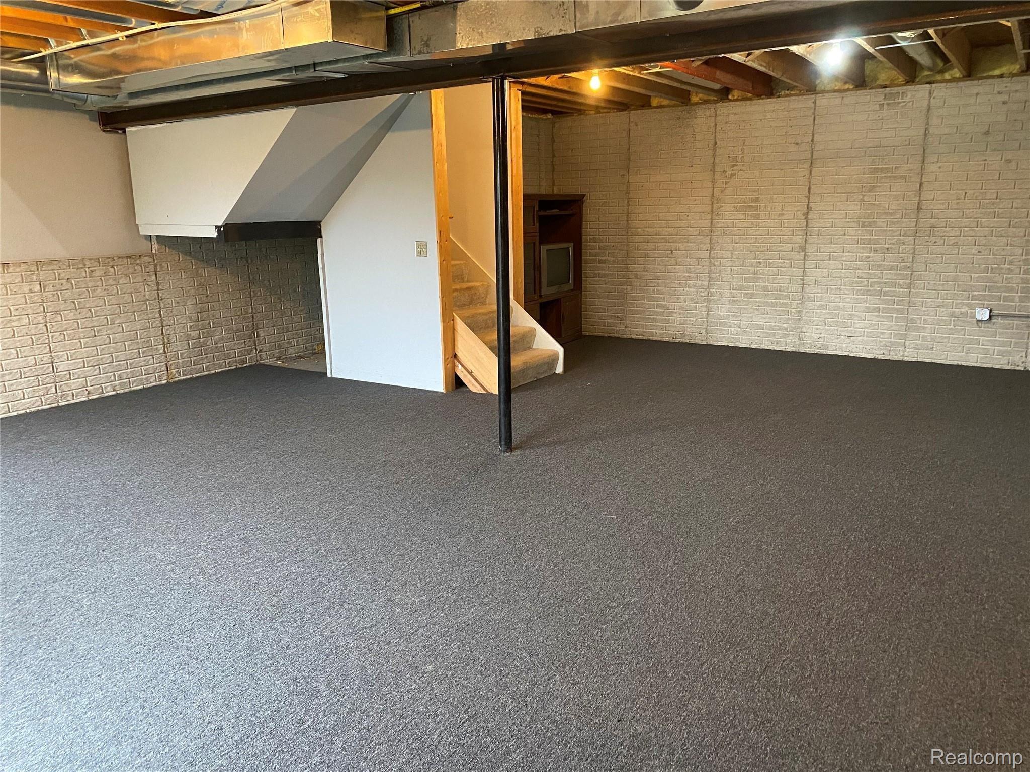 603 East Davisburg Road Holly, MI 48442 - Photo 24 of 29 Lower Level Has Carpet! Update Electric!