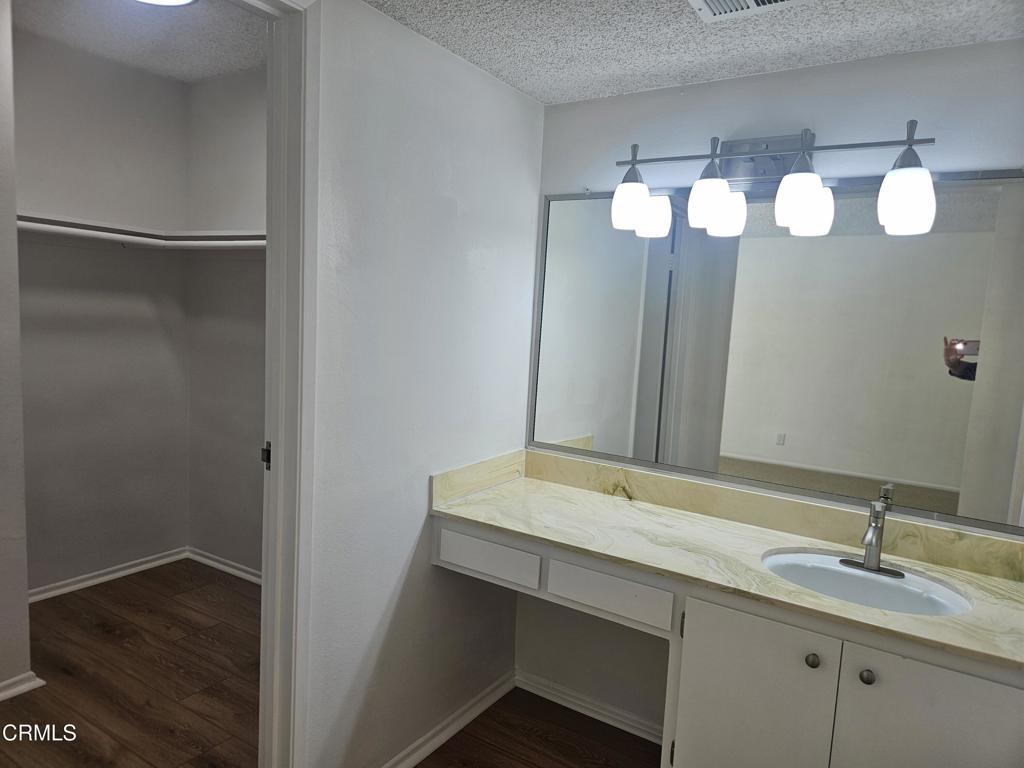3510 Isle Way Oxnard, CA 93035 - Photo 15 of 26 a bathroom with a sink and a mirror