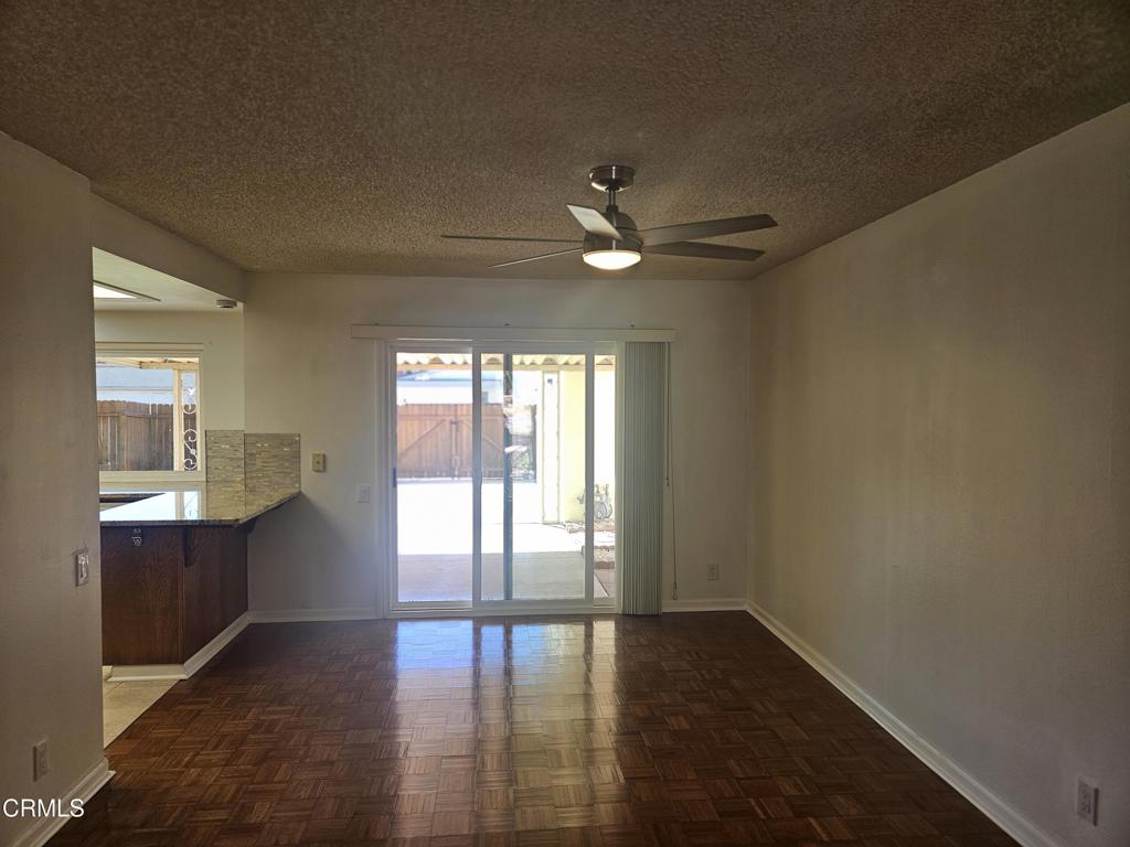 3510 Isle Way Oxnard, CA 93035 - Photo 8 of 26 a view of an empty room with window and wooden floor