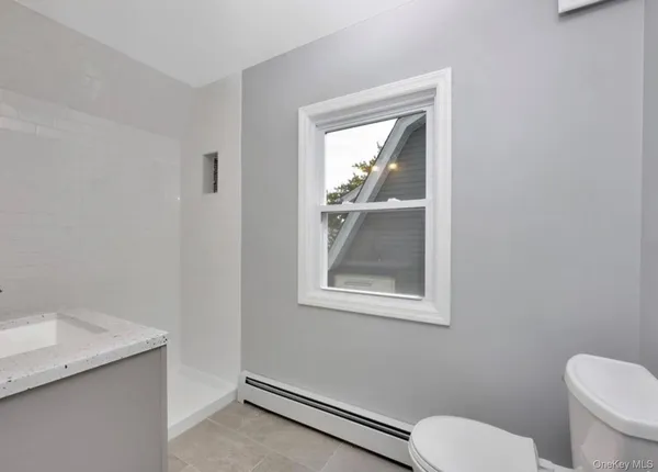 a bathroom with a toilet