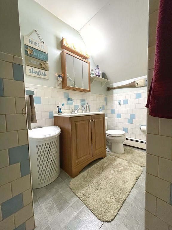 550 Eastern Avenue Lynn, MA 01902 - Photo 23 of 32 a bathroom with a sink toilet and shower