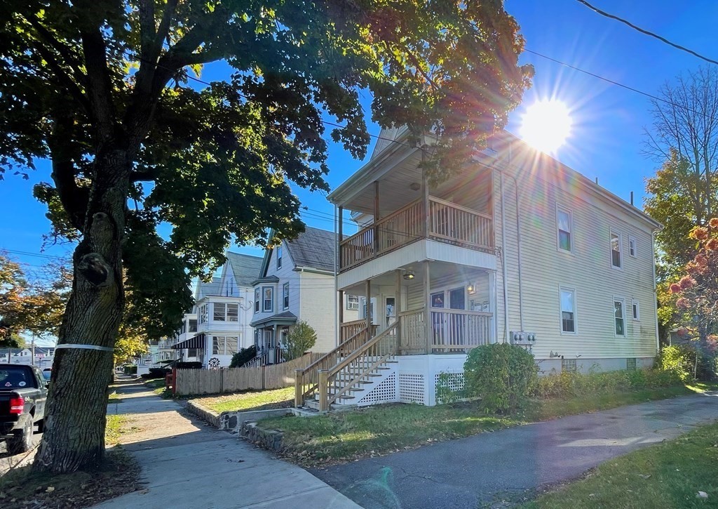 550 Eastern Avenue Lynn, MA 01902 - Photo 3 of 32 a view of a house with a yard