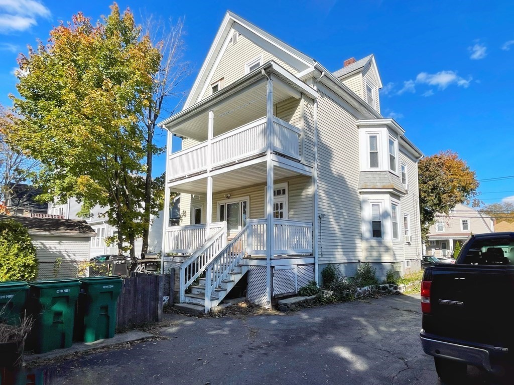 550 Eastern Avenue Lynn, MA 01902 - Photo 4 of 32 a view of a house with a yard