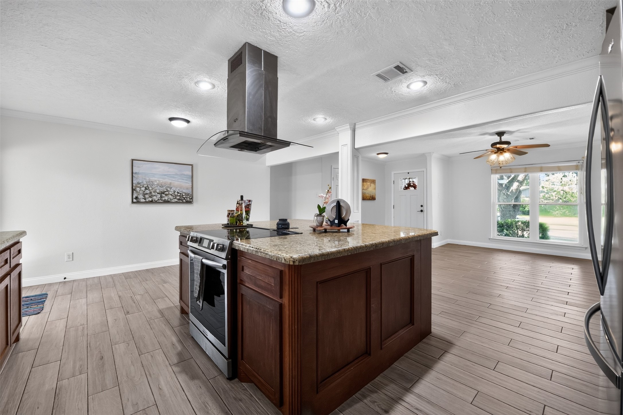 10407 Winding Trail Road La Porte, TX 77571 - Photo 14 of 40 Kitchen opens to a bright dining area, creating an easy flow for meals and gatherings