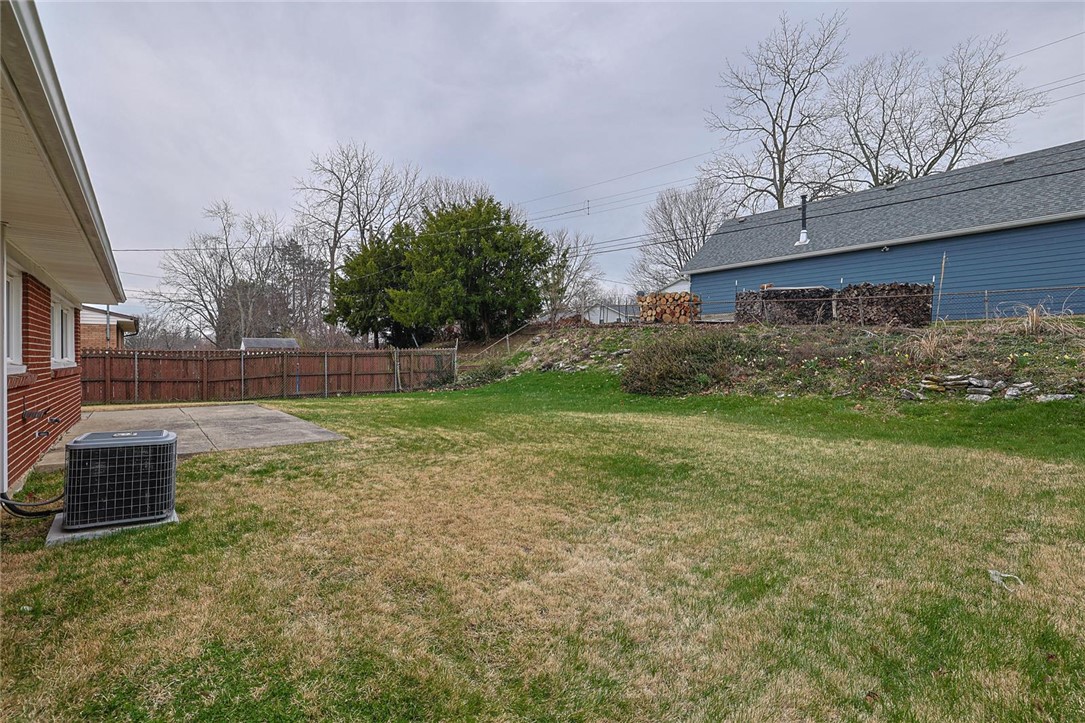 4307 Meadowcroft Road Dayton, OH 45429 - Photo 24 of 26 This spacious backyard offers ample outdoor living space, perfect for recreation and entertaining.