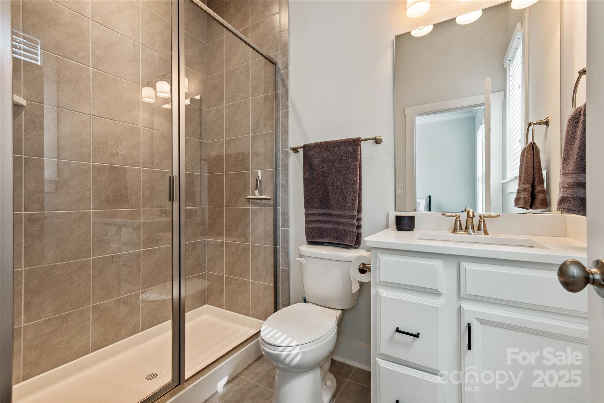 1244 Weir Court Fort Mill, SC 29708 - Photo 15 of 48 a bathroom with a sink toilet and shower