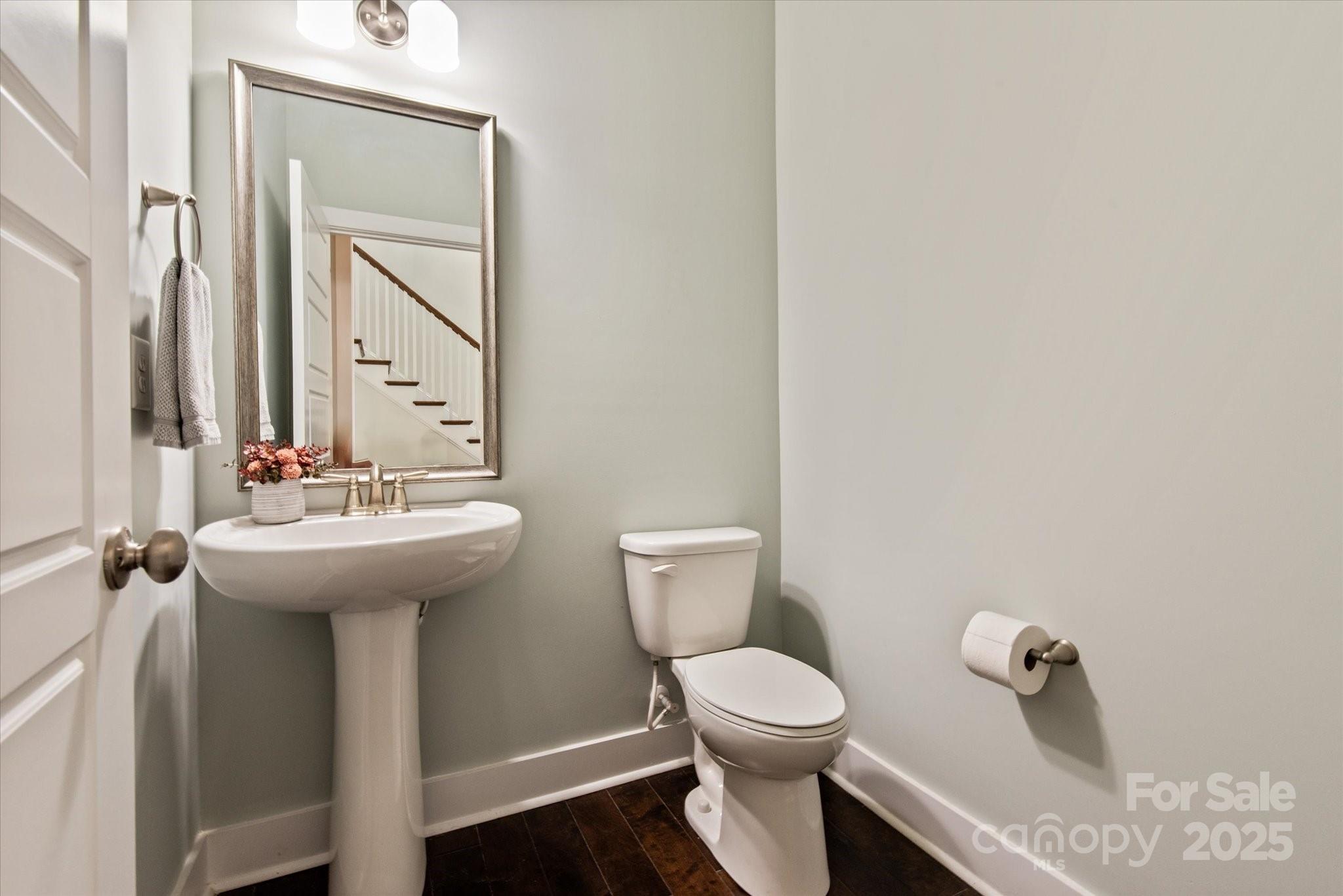 1244 Weir Court Fort Mill, SC 29708 - Photo 17 of 48 a bathroom with a sink and mirror with toilet