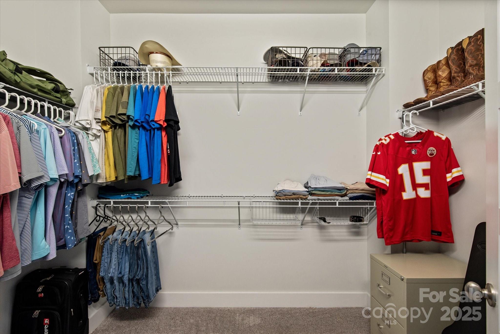 1244 Weir Court Fort Mill, SC 29708 - Photo 25 of 48 a view of walk in closet with clothes and shoes