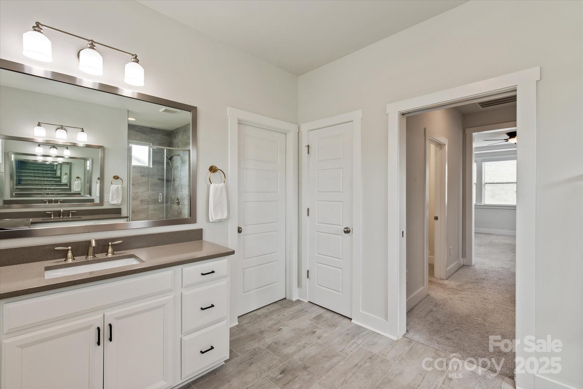 1244 Weir Court Fort Mill, SC 29708 - Photo 26 of 48 a bathroom with a sink and a mirror