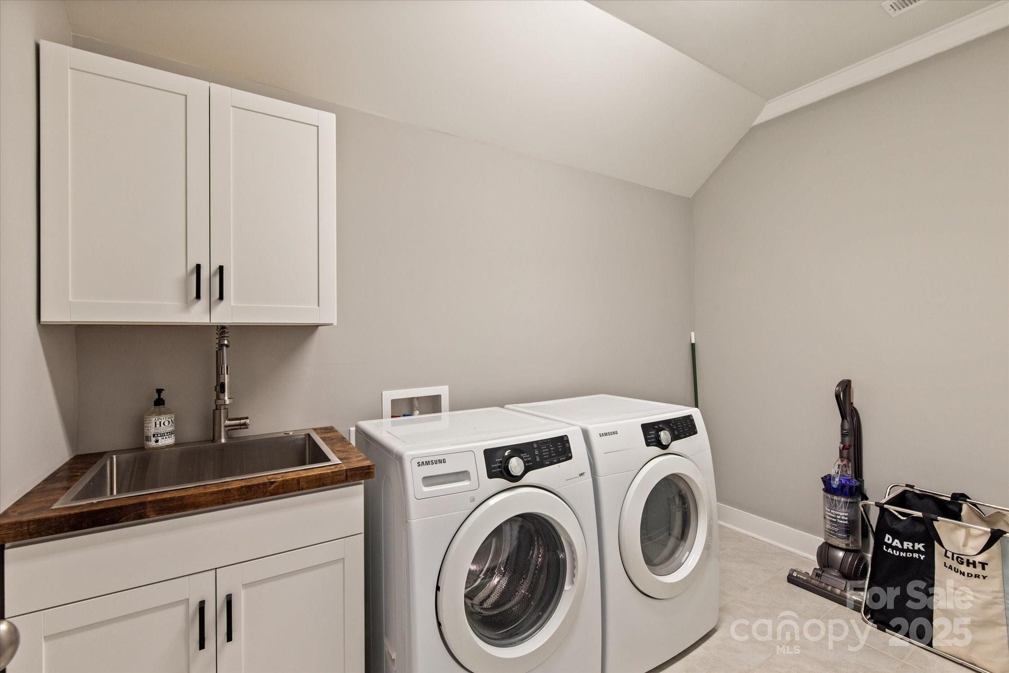 1244 Weir Court Fort Mill, SC 29708 - Photo 30 of 48 a view of storage and utility room with washer and dryer
