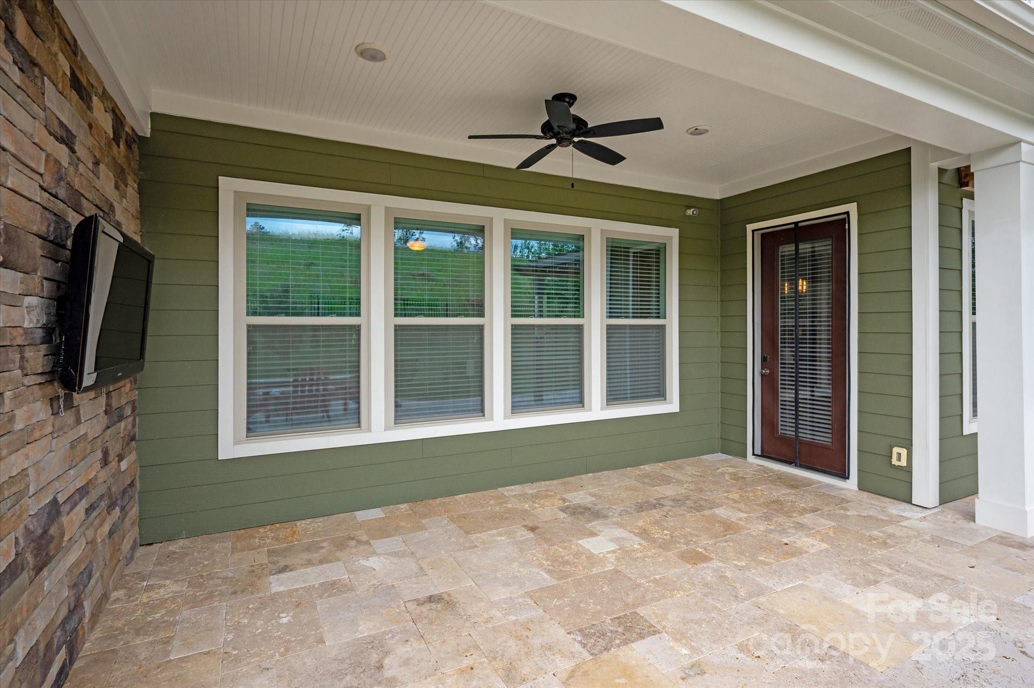 1244 Weir Court Fort Mill, SC 29708 - Photo 36 of 48 a view of an empty room with a fireplace and a window