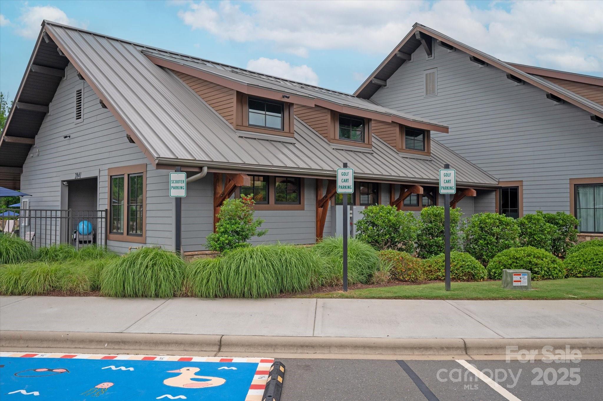 1244 Weir Court Fort Mill, SC 29708 - Photo 44 of 48 a front view of a house with a yard