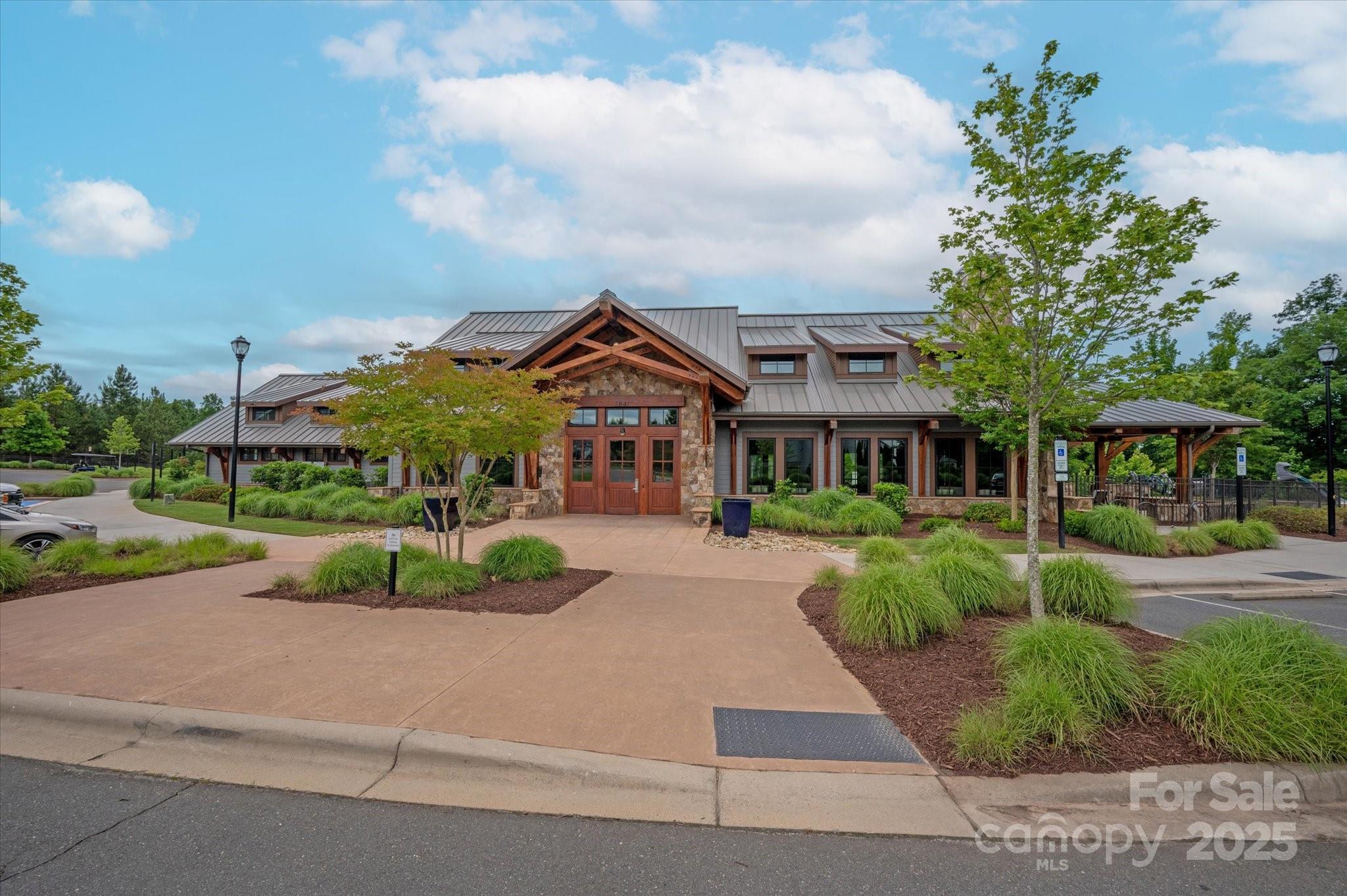 1244 Weir Court Fort Mill, SC 29708 - Photo 45 of 48 a front view of a house with a yard