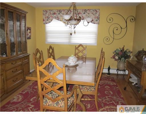 11 Timber Road Edison, NJ 08820 - Photo 5 of 17 a view of a dining room with furniture and a window