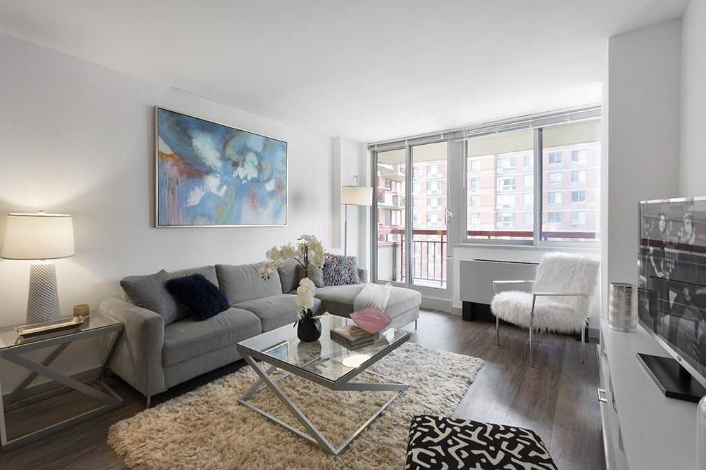 a living room with furniture and a couch