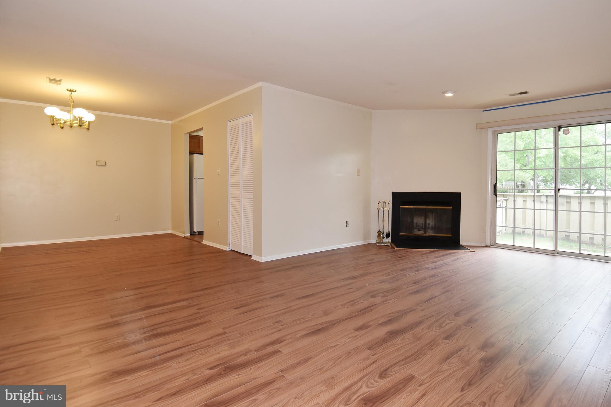 13111 Conductor Way, Unit 238 Silver Spring, MD 20904 - Photo 3 of 30 All new flooring in the living and dining rooms.