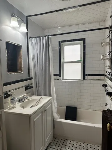 a view of a chairs and table in the backyard