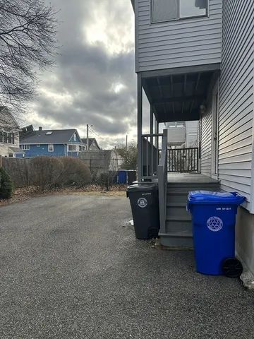 a view of a house with iron fence