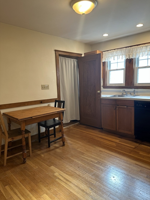 33 Amsden Street, Unit 1 Arlington, MA 02474 - Photo 8 of 18 a view of a room with furniture and window