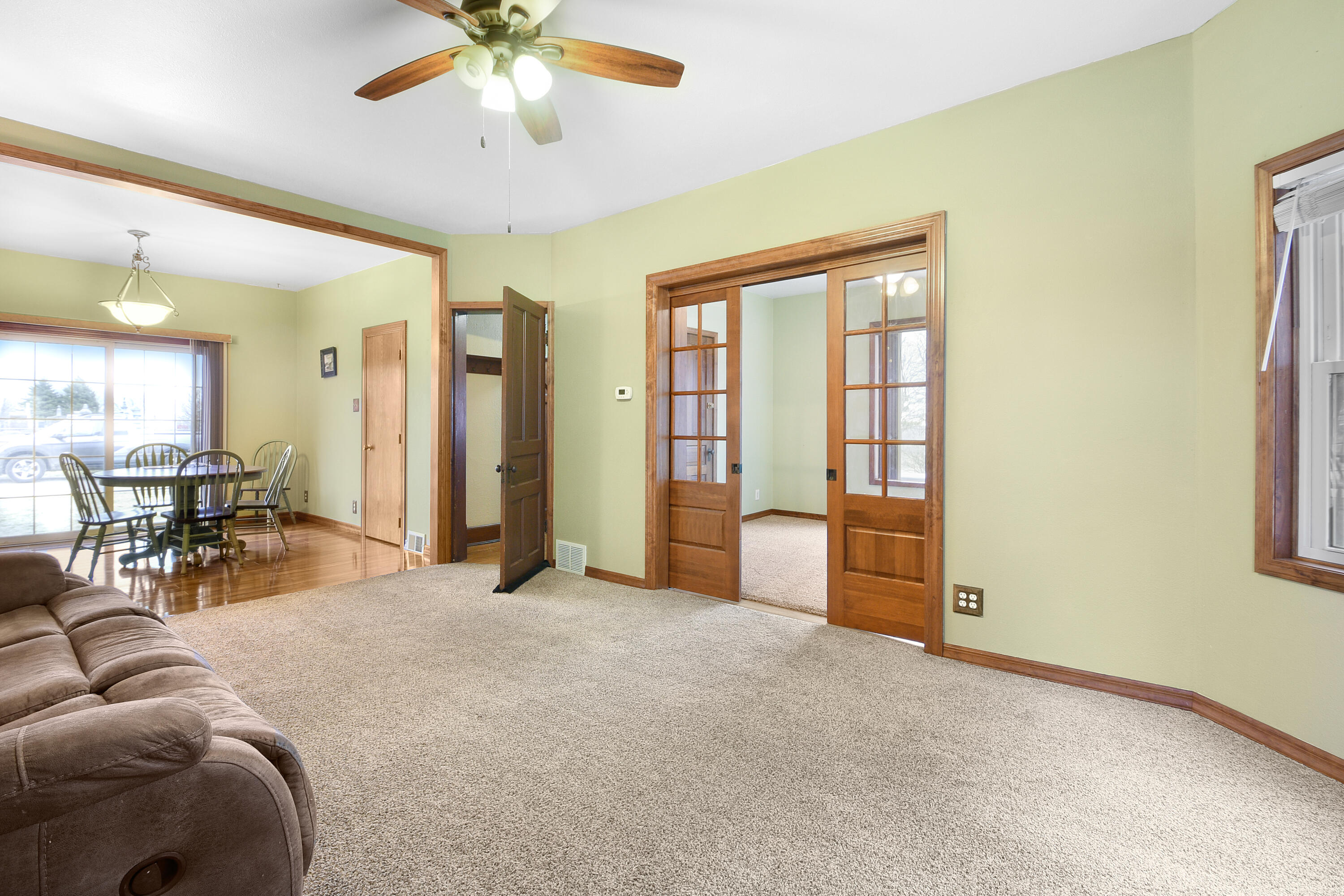 W6552 State Highway 144 Sherman, WI 53075 - Photo 3 of 20 Living room to dining room and den
