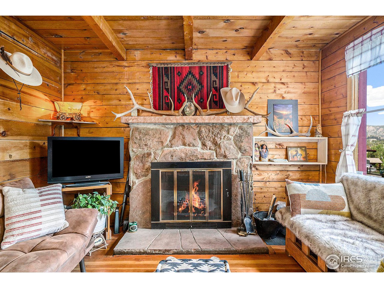 960 Riverside Drive, Unit 2 Estes Park, CO 80517 - Photo 2 of 20 Wood burning fireplace