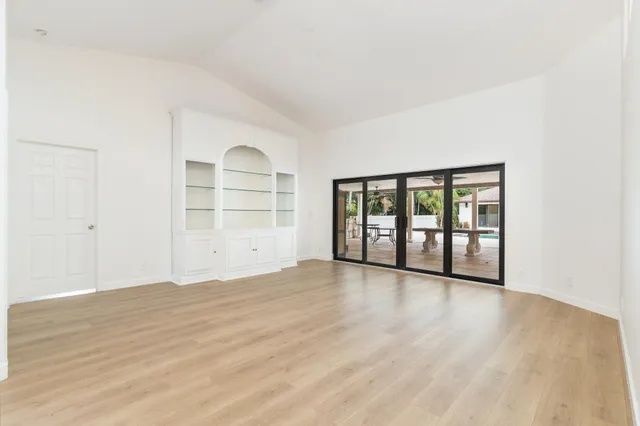 a view of an empty room and window