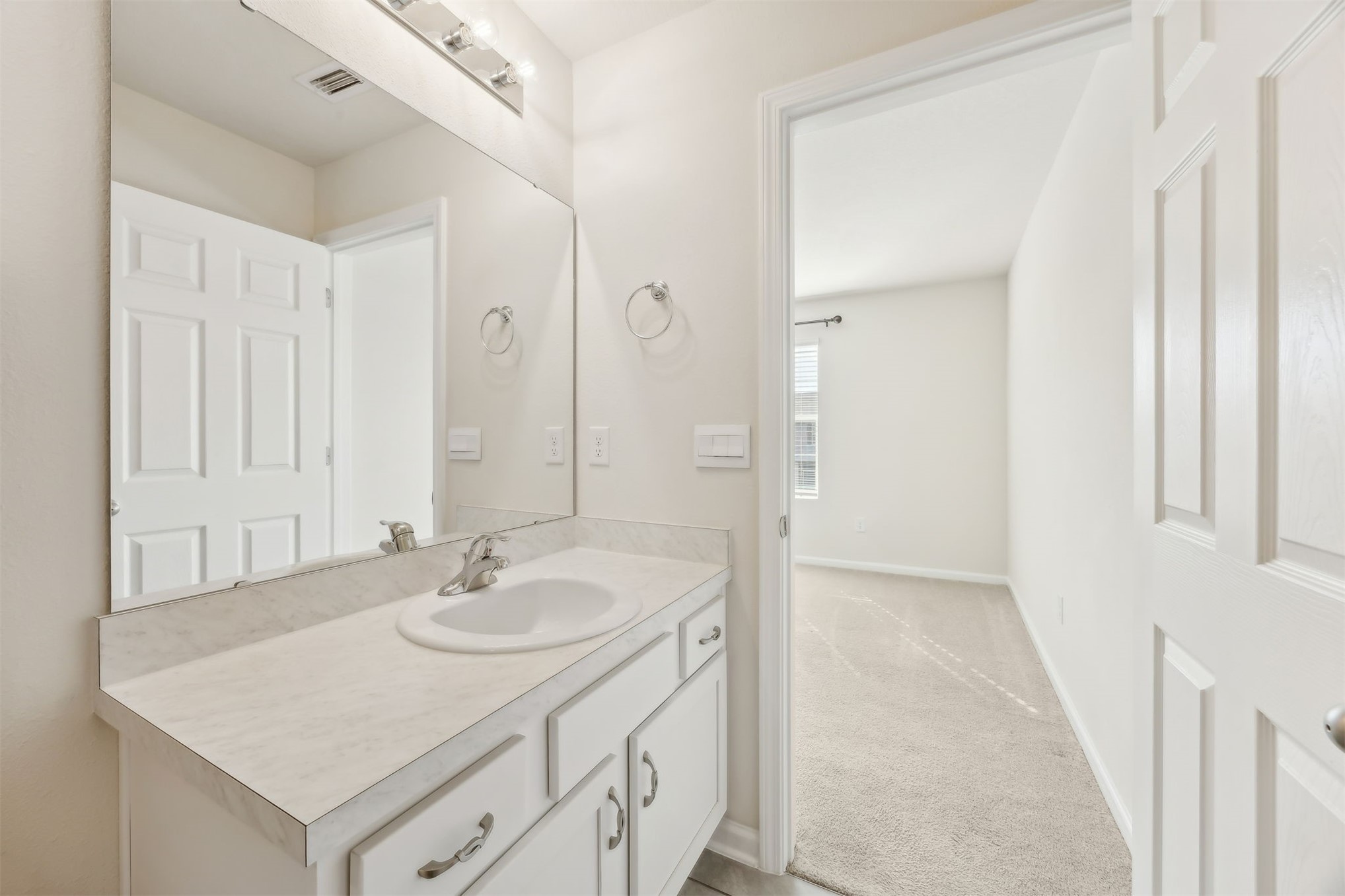 86440 Shortline Circle Yulee, FL 32097 - Photo 26 of 50 a bathroom with a sink and a mirror