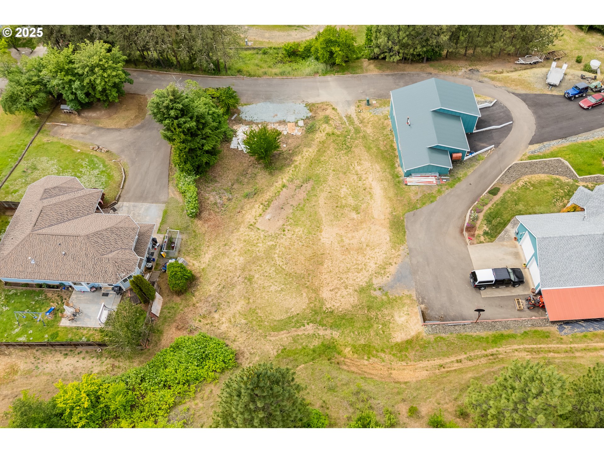 1140 Arburnia Street Myrtle Creek, OR 97457 - Photo 8 of 14 aerial view of a house with a lake view