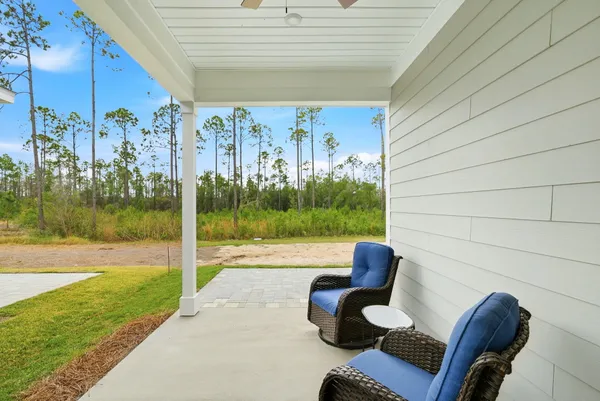 a view of a patio with garden