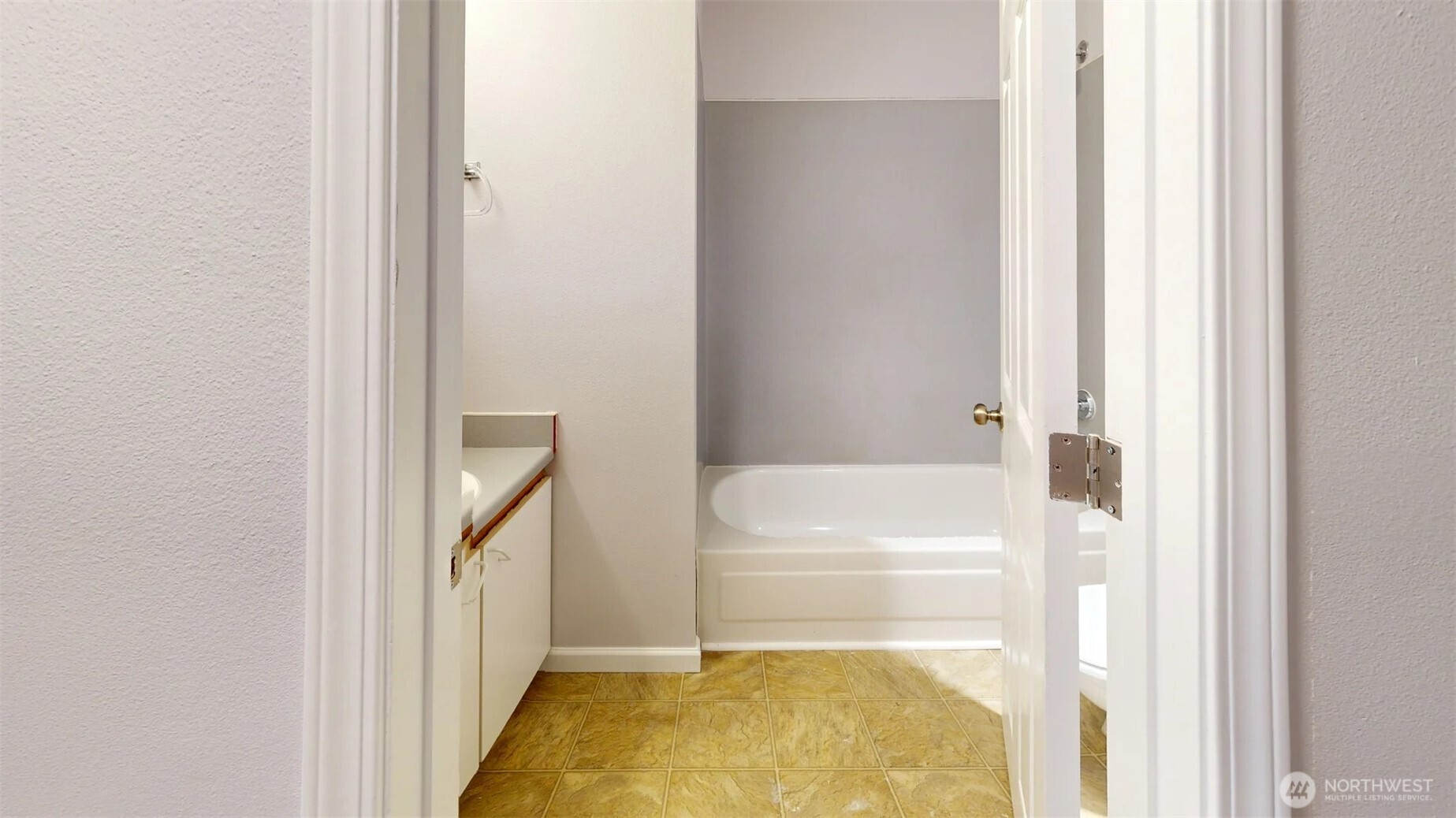 29645 18th Avenue South, Unit A303 Federal Way, WA 98003 - Photo 14 of 19 a bathroom with a tub