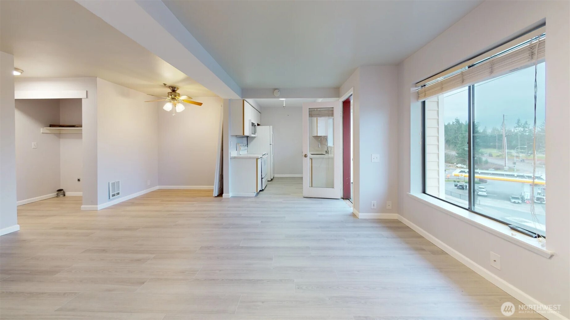29645 18th Avenue South, Unit A303 Federal Way, WA 98003 - Photo 9 of 19 a view of an empty room with a window