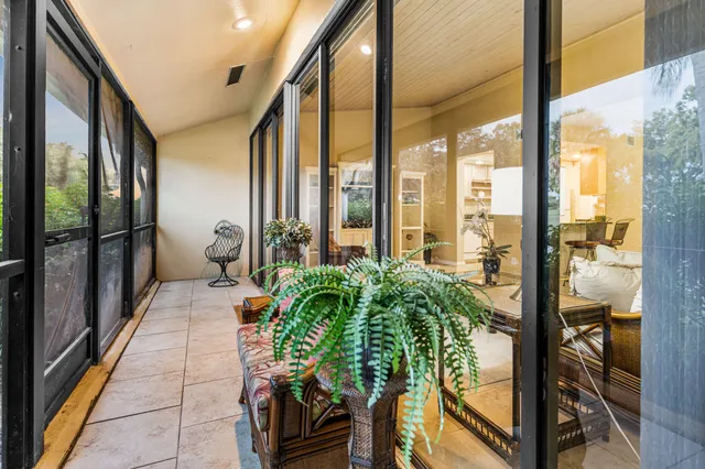 a room with balcony and furniture