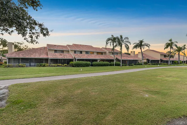 a view of a house with a big yard