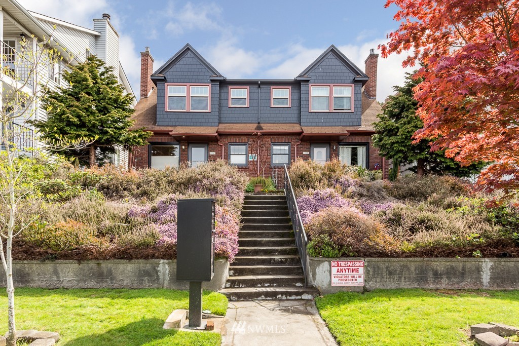 2609 Rucker Avenue Everett, WA 98201 - Photo 1 of 15 a front view of a house with a yard