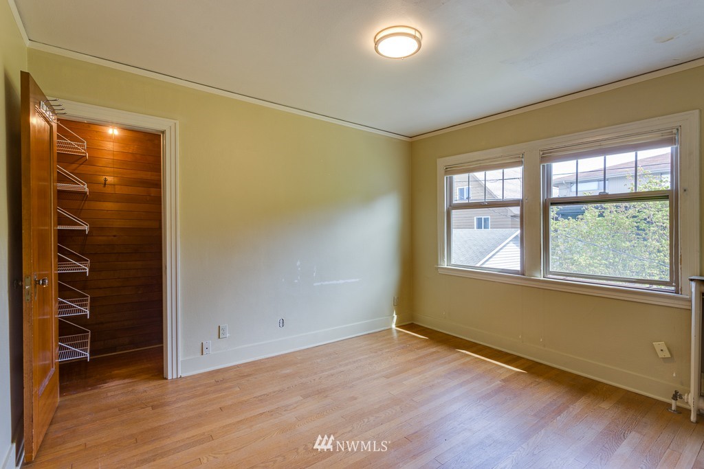 2609 Rucker Avenue Everett, WA 98201 - Photo 12 of 15 an empty room with window wooden floor and closet