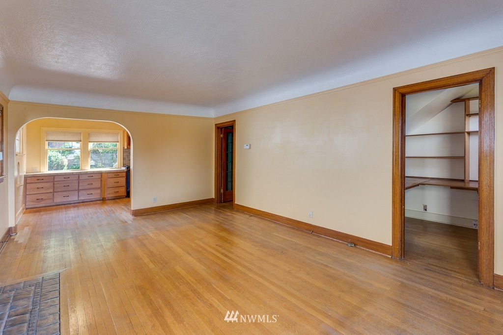 2609 Rucker Avenue Everett, WA 98201 - Photo 5 of 15 a view of empty room with wooden floor and fan