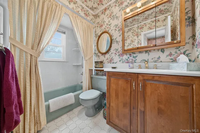 a view of a deck with table and chairs and wooden floor