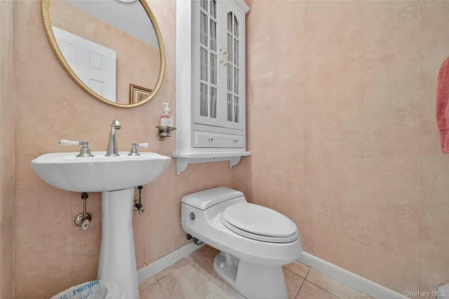 a view of a patio with a table and chairs