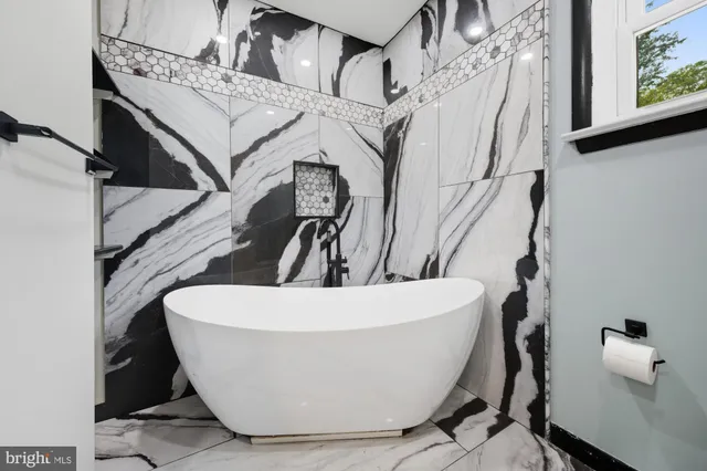 a view of a bathtub in a room