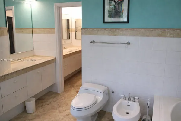 a bathroom with a sink and a toilet