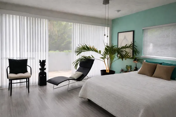 a living room with furniture and a window