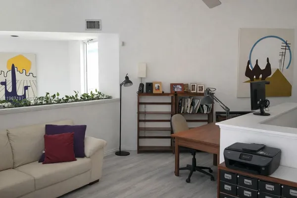 a bathroom with a tub and shower