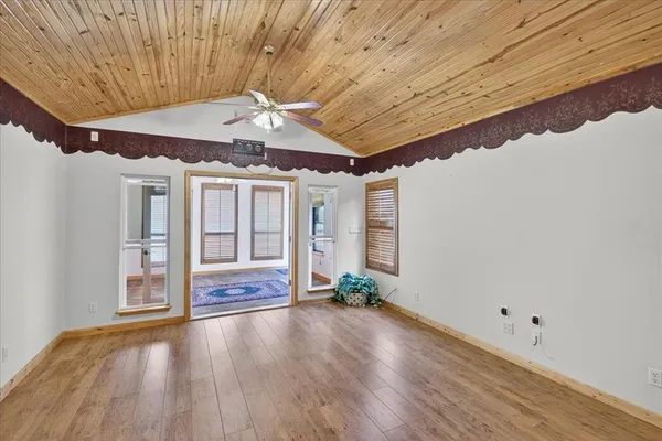 a view of entryway with wooden floor