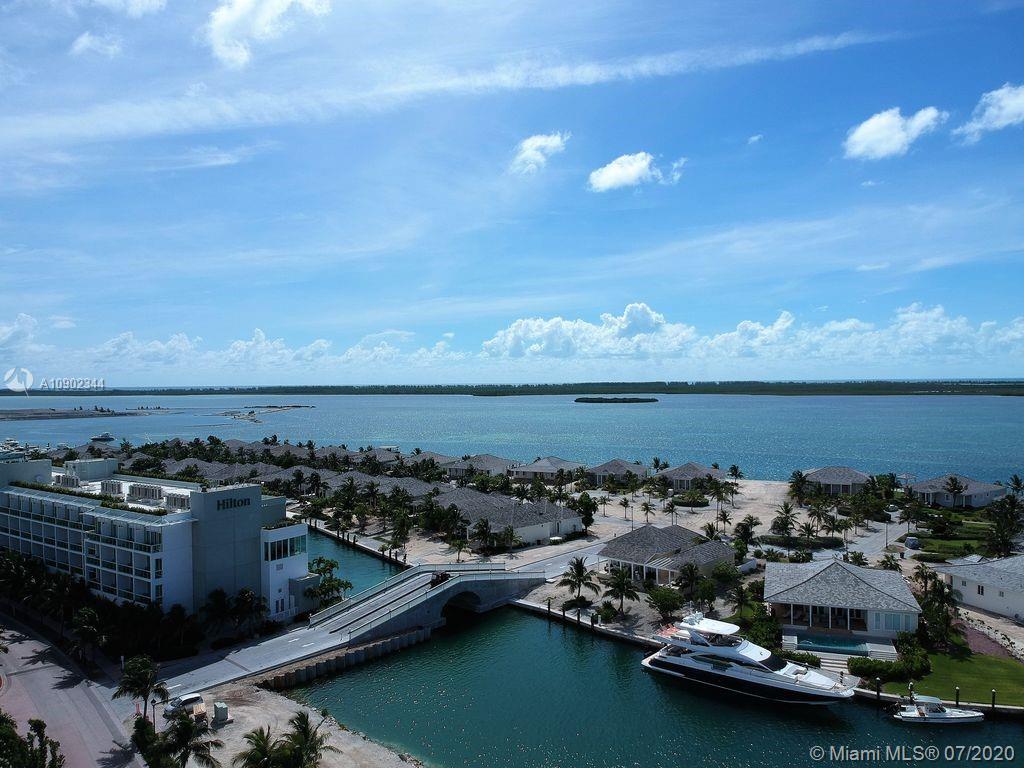 6900 Bimini Bahamas undefined, BH 0000 - Photo 15 of 17 an aerial view of a city with lots of residential buildings ocean and mountain view in back