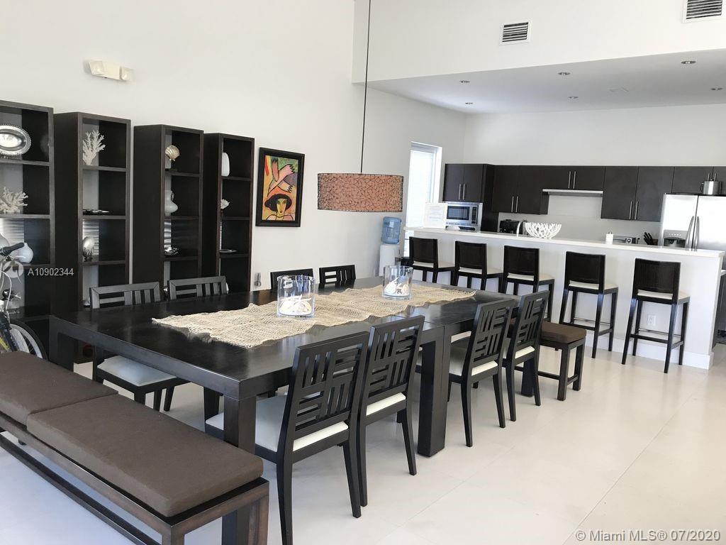 6900 Bimini Bahamas undefined, BH 0000 - Photo 4 of 17 a view of a dining room with furniture