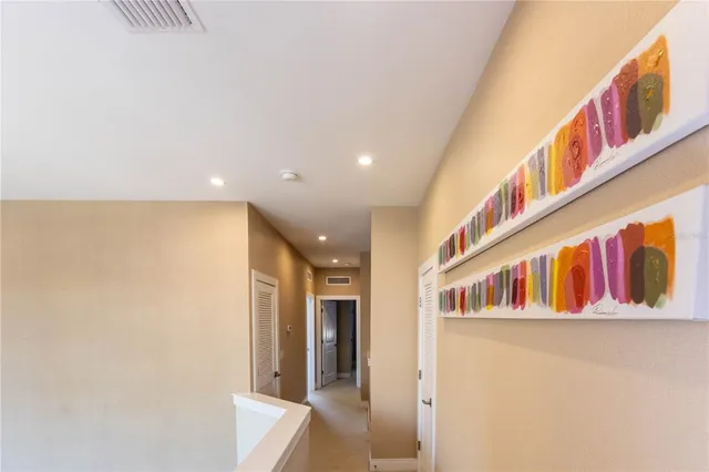 a view of a living room and a balcony