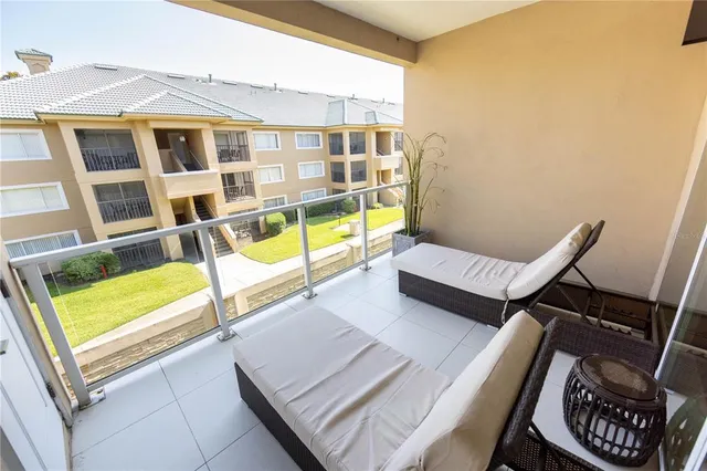 a bedroom with a bed and a view of bathroom